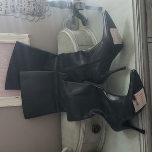 Thigh high black zip up boots size 6
